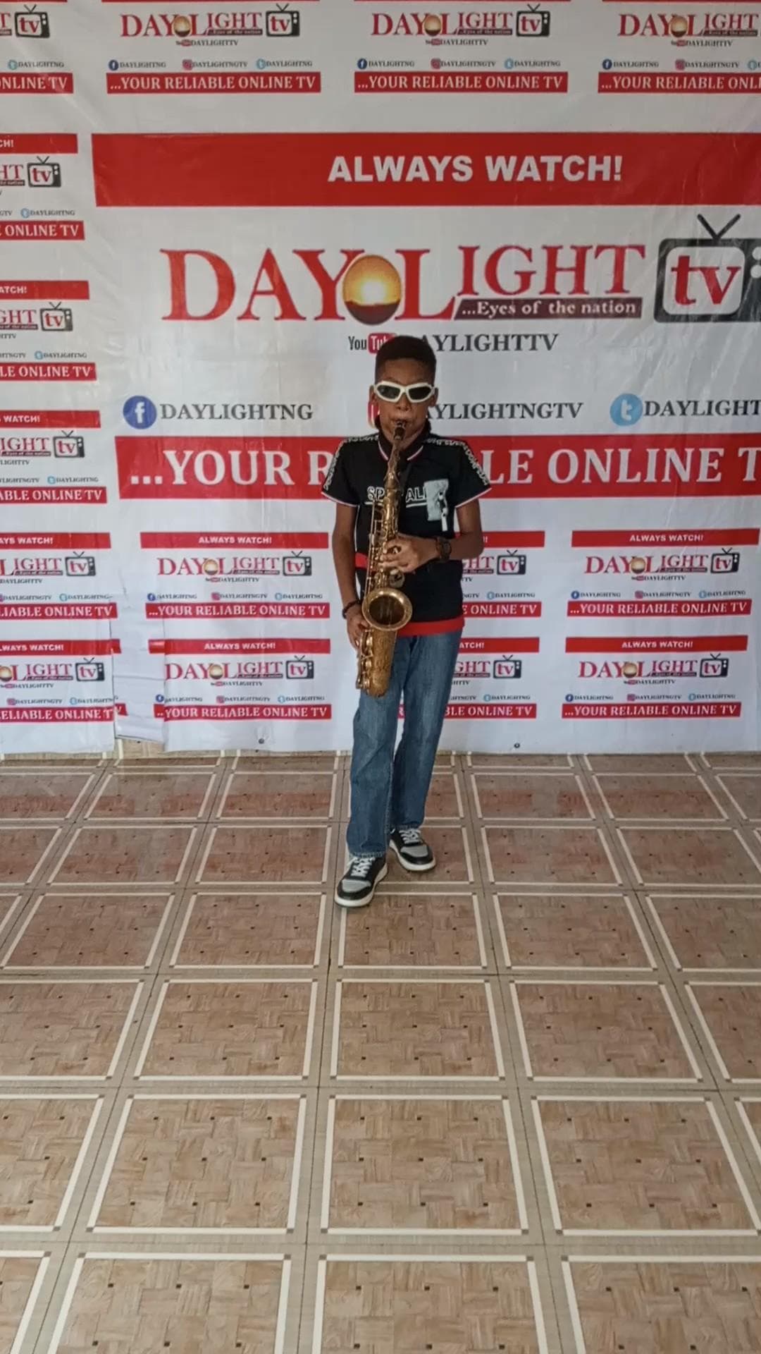 VIDEO: Daylight Publisher’s multi-talented 10 year-old son, CJ Sax thrilling Nigerians with our national anthem on Independence Day