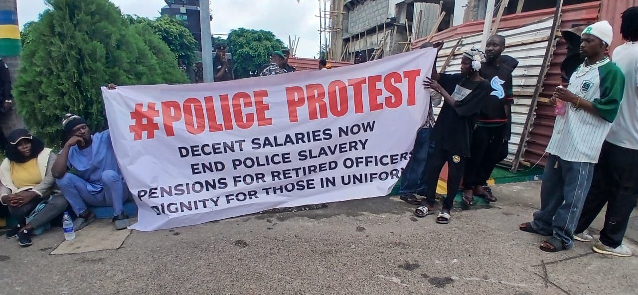 Retired police officers protest under rain at N’Assembly gate