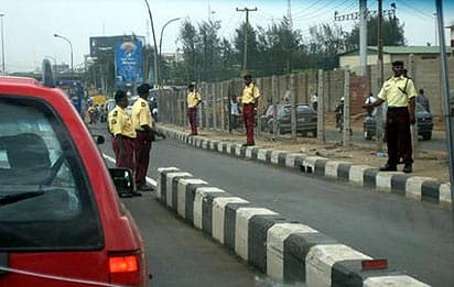 One dies, three injured as yam-laden truck rams tricycle in Lagos